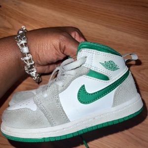 Green and white Toddler Jordan’s